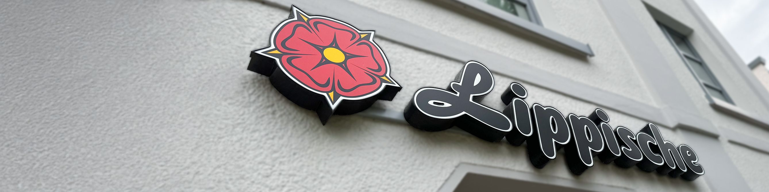 Das Bild zeigt den Schriftzug Lippische an dem Haus einer Geschäftsstelle.